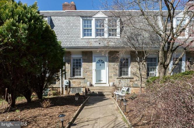 1804 37th Street Northwest Washington, DC 20007 - Photo 1 of 4 a front view of a house with garden