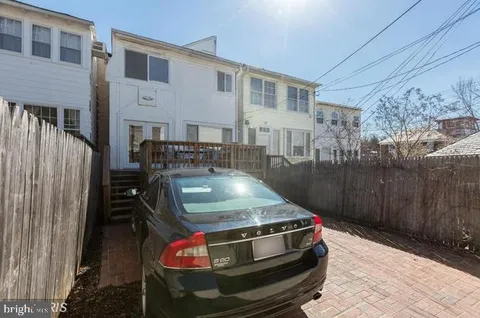 a view of a street with cars