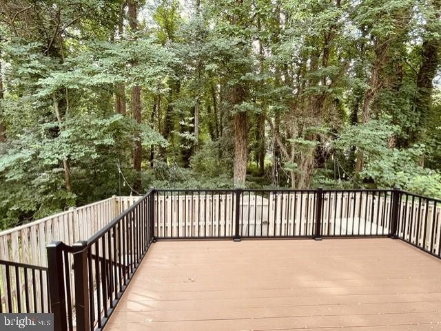 1016 Windrush Lane, Unit 25 Sandy Spring, MD 20860 - Photo 9 of 37 Private deck overlooking woods.