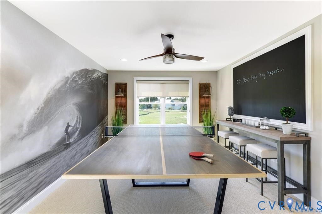 15913 Maclear Drive Midlothian, VA 23112 - Photo 13 of 31 a living room with furniture and a flat screen tv