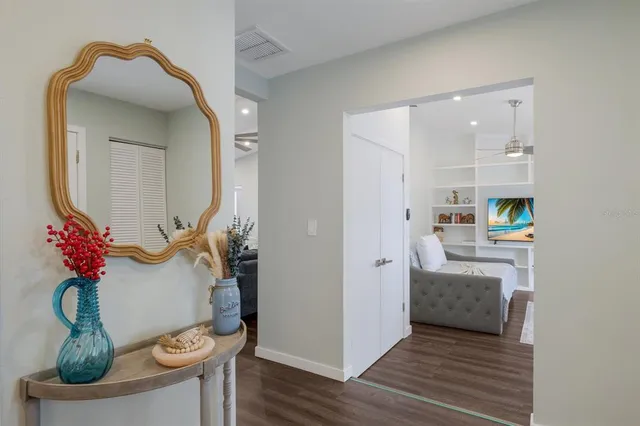 a bathroom with a double vanity sink mirror and toilet