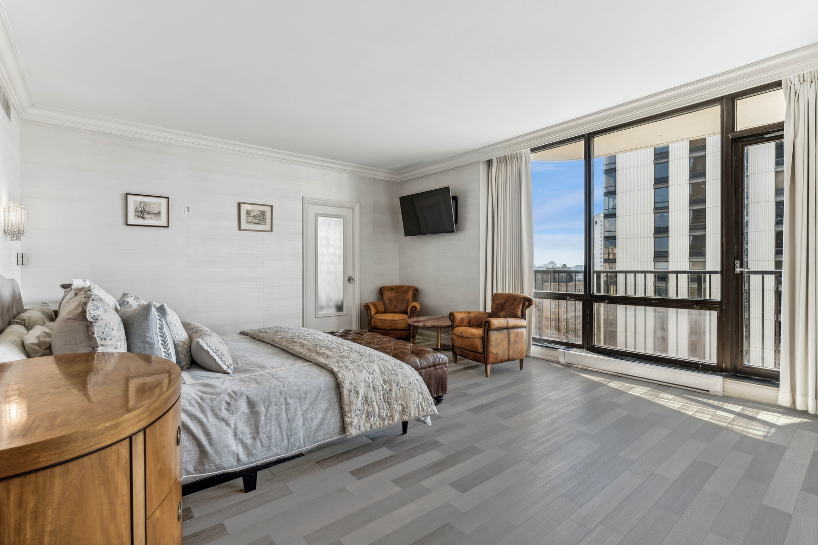 1040 North Lake Shore Drive, Unit 26B Chicago, IL 60611 - Photo 13 of 22 a bedroom with a bed and a large window