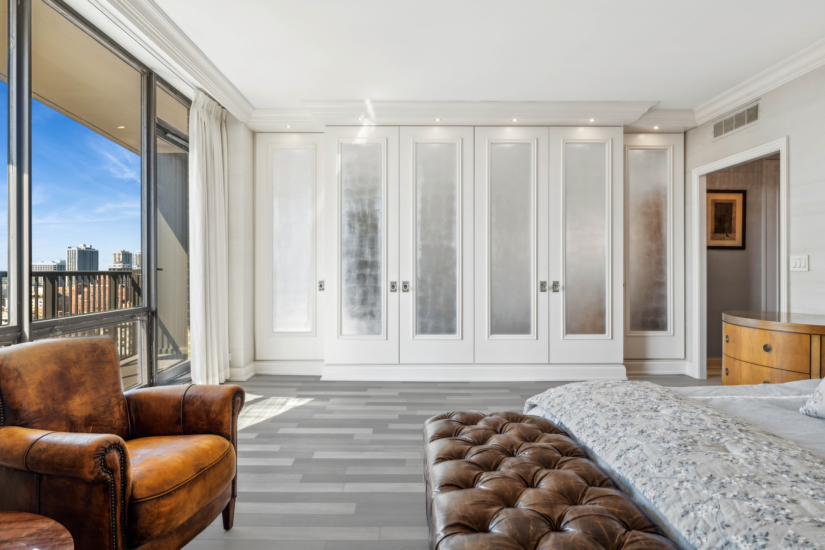 1040 North Lake Shore Drive, Unit 26B Chicago, IL 60611 - Photo 14 of 22 a bedroom with furniture and a large window