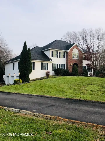 a view of entryway with a front door