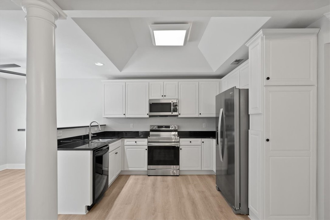 100 Shipyard Circle Anderson, SC 29621 - Photo 11 of 40 This sleek kitchen features modern appliances and ample storage, creating an inviting culinary space.