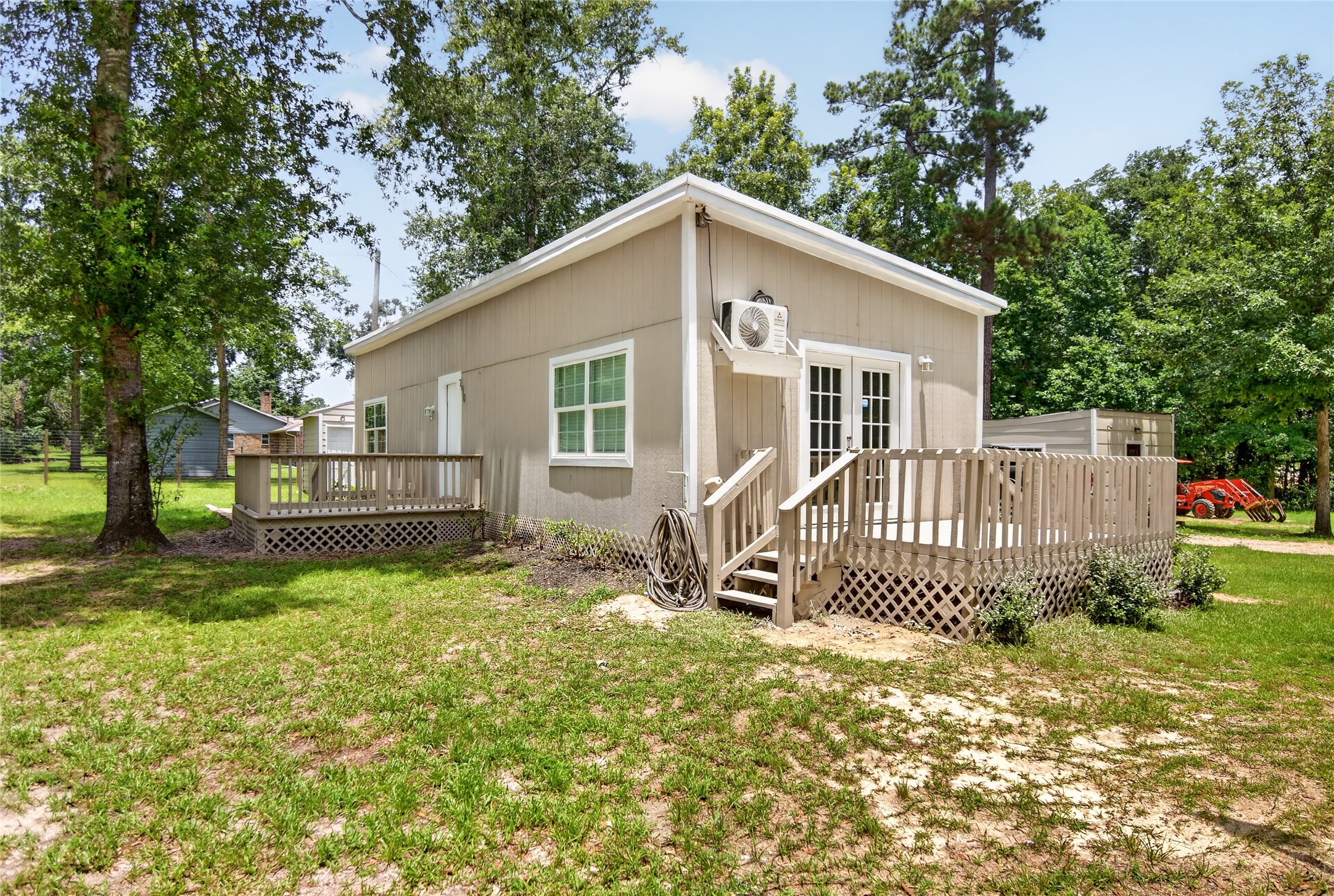 290 Magnolia Road Cleveland, TX 77328 - Photo 2 of 14 Side view with a nice porch