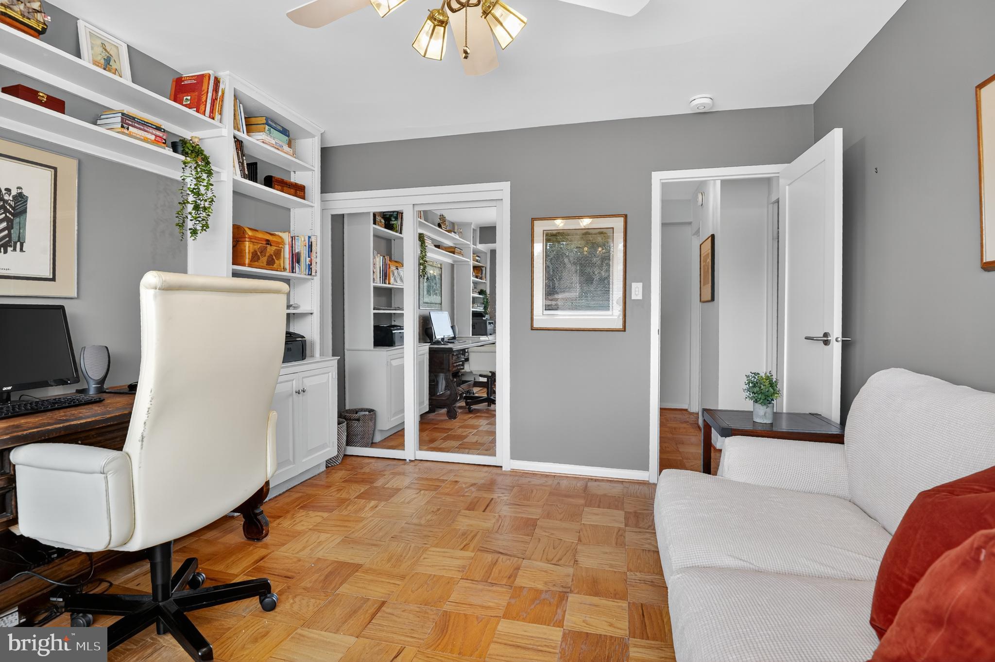 5100 Dorset Avenue, Unit 314 Chevy Chase, MD 20815 - Photo 18 of 30 a living room with furniture and a rug
