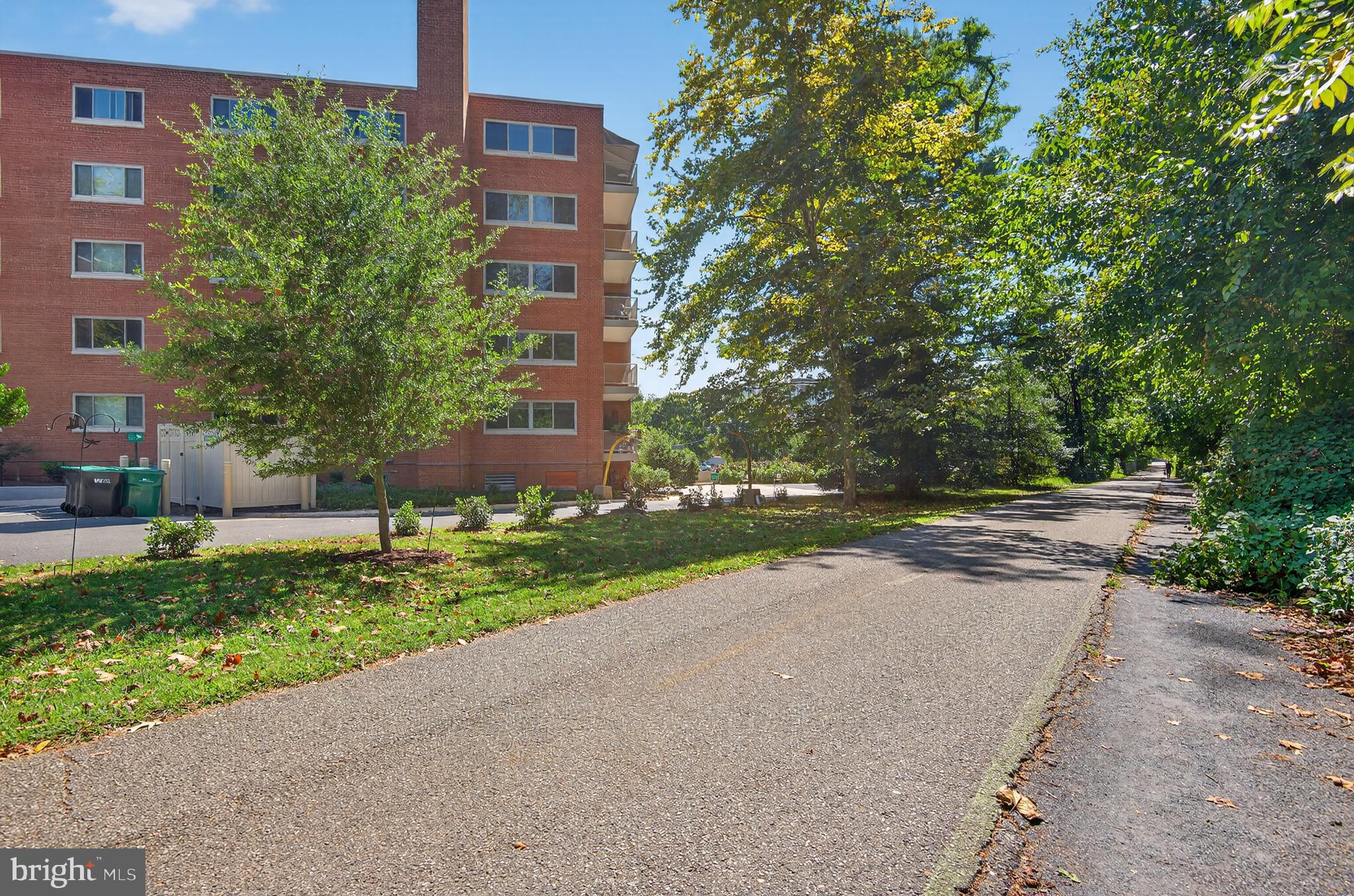 5100 Dorset Avenue, Unit 314 Chevy Chase, MD 20815 - Photo 26 of 30 a view of a street with a building and a street