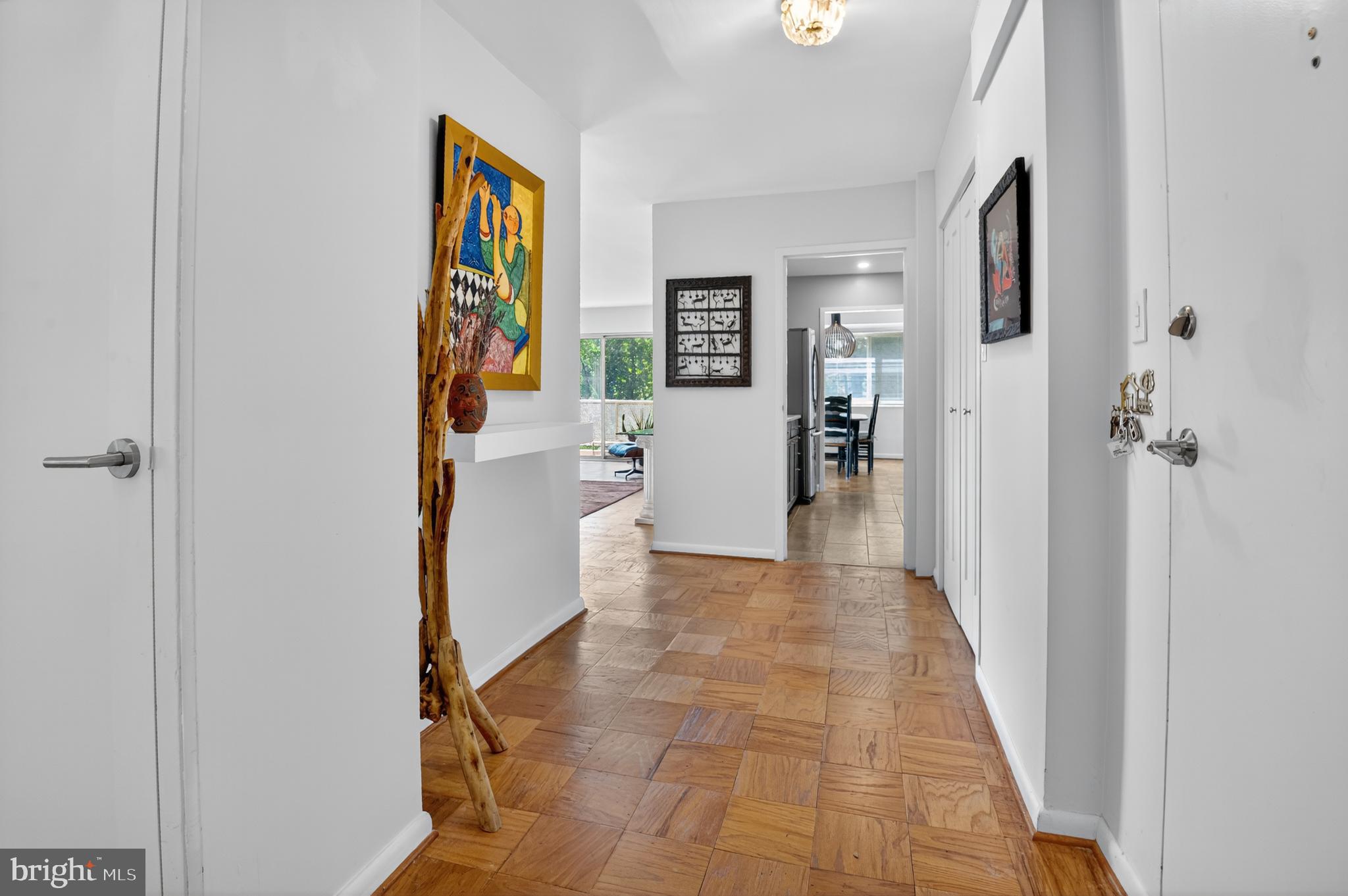 5100 Dorset Avenue, Unit 314 Chevy Chase, MD 20815 - Photo 3 of 30 a view of a hallway with furniture and entryway
