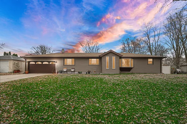 a view of a house with a big yard