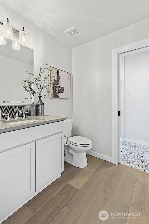 33632 Northeast 42nd Street Carnation, WA 98014 - Photo 15 of 28 a bathroom with a toilet sink and mirror