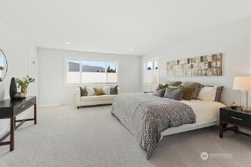 33632 Northeast 42nd Street Carnation, WA 98014 - Photo 19 of 28 a spacious bedroom with a bed and a couch