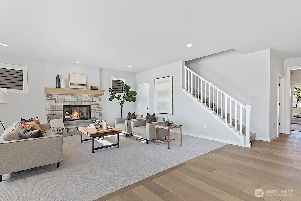 33632 Northeast 42nd Street Carnation, WA 98014 - Photo 5 of 28 a living room with furniture and a fireplace