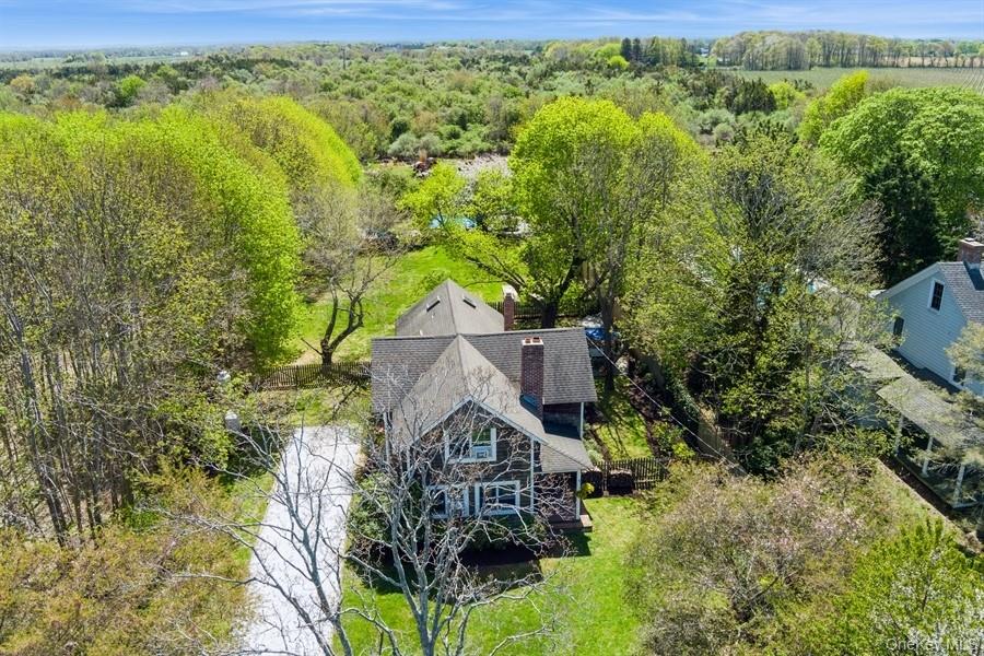 a picture of a house with a yard