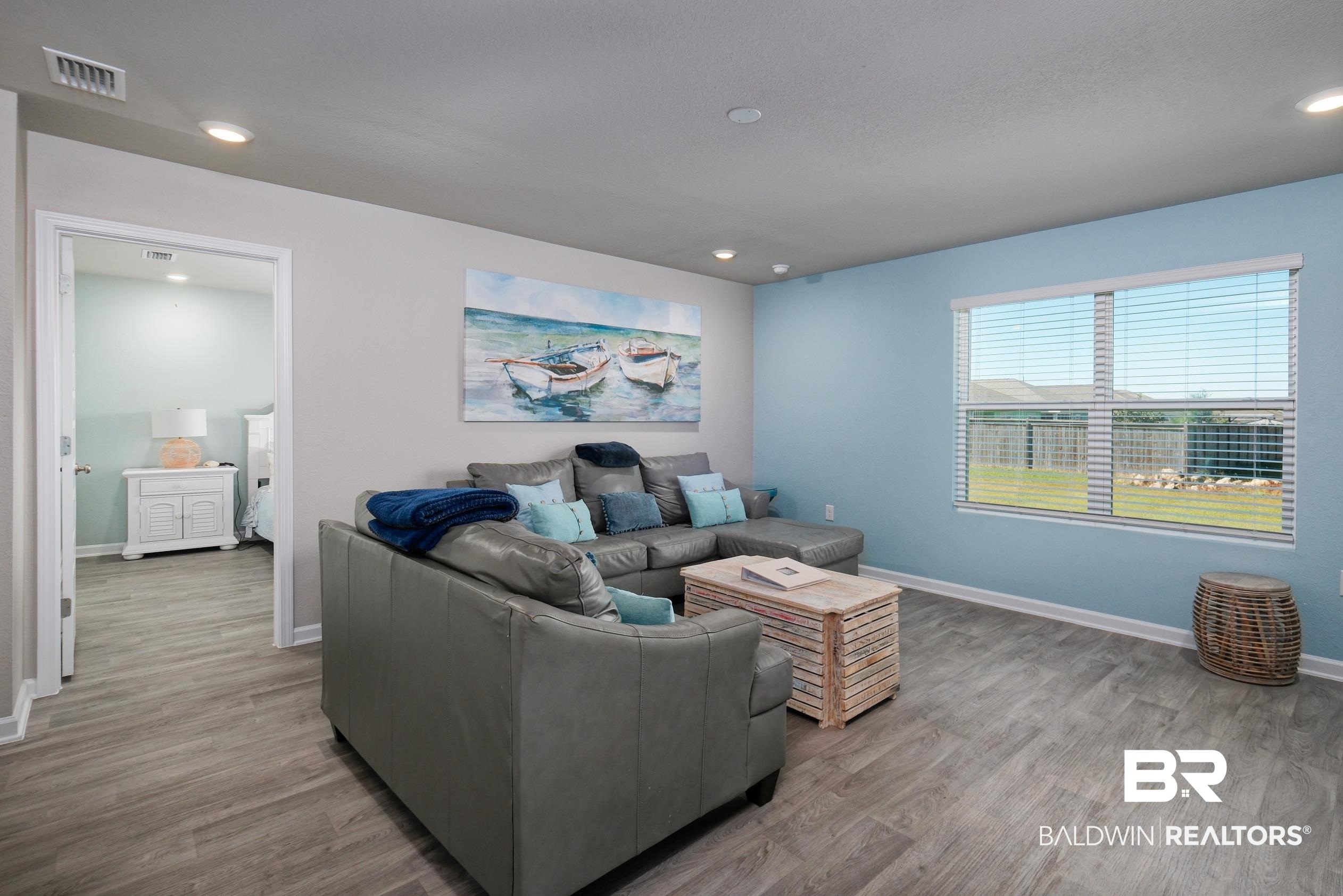 7425 Coppin Drive Foley, AL 36535 - Photo 15 of 41 Living room featuring hardwood / wood-style floors
