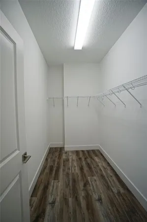 a room that has a bed and a window