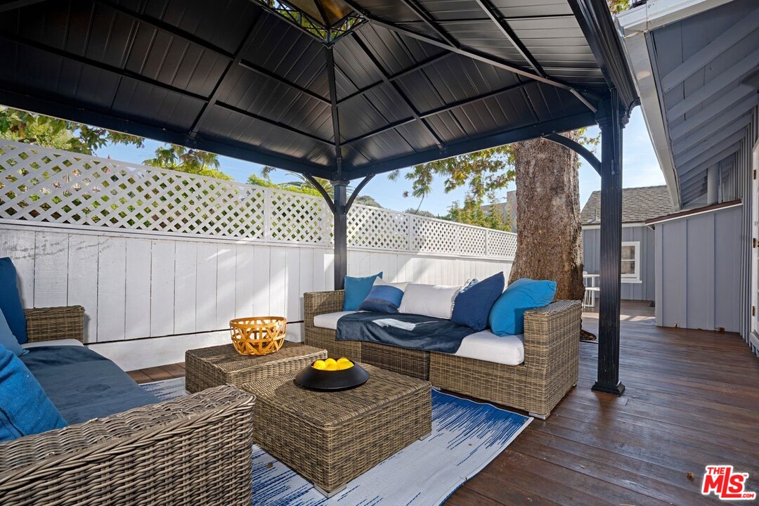 216 West Channel Road Santa Monica, CA 90402 - Photo 23 of 37 a view of outdoor space with lounge chair