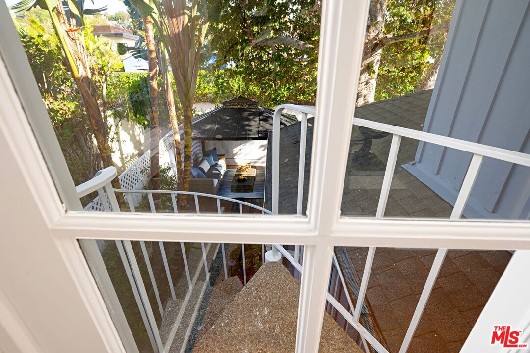 216 West Channel Road Santa Monica, CA 90402 - Photo 29 of 37 a view of balcony with wooden floor and fence