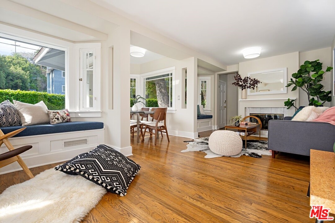 216 West Channel Road Santa Monica, CA 90402 - Photo 10 of 37 a living room with furniture and a large window