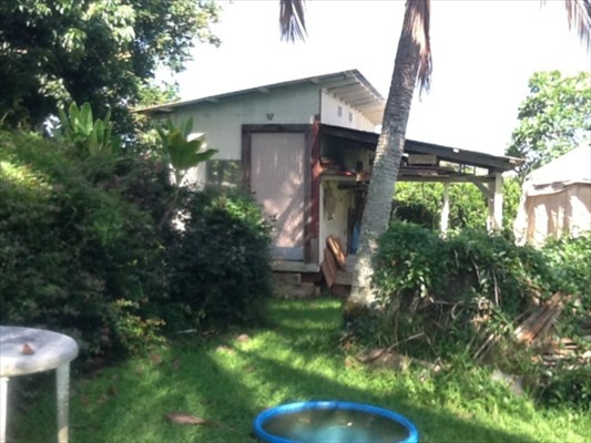 4085 Noho Road Koloa, HI 96756 - Photo 2 of 4 a backyard of a house with lots of green space