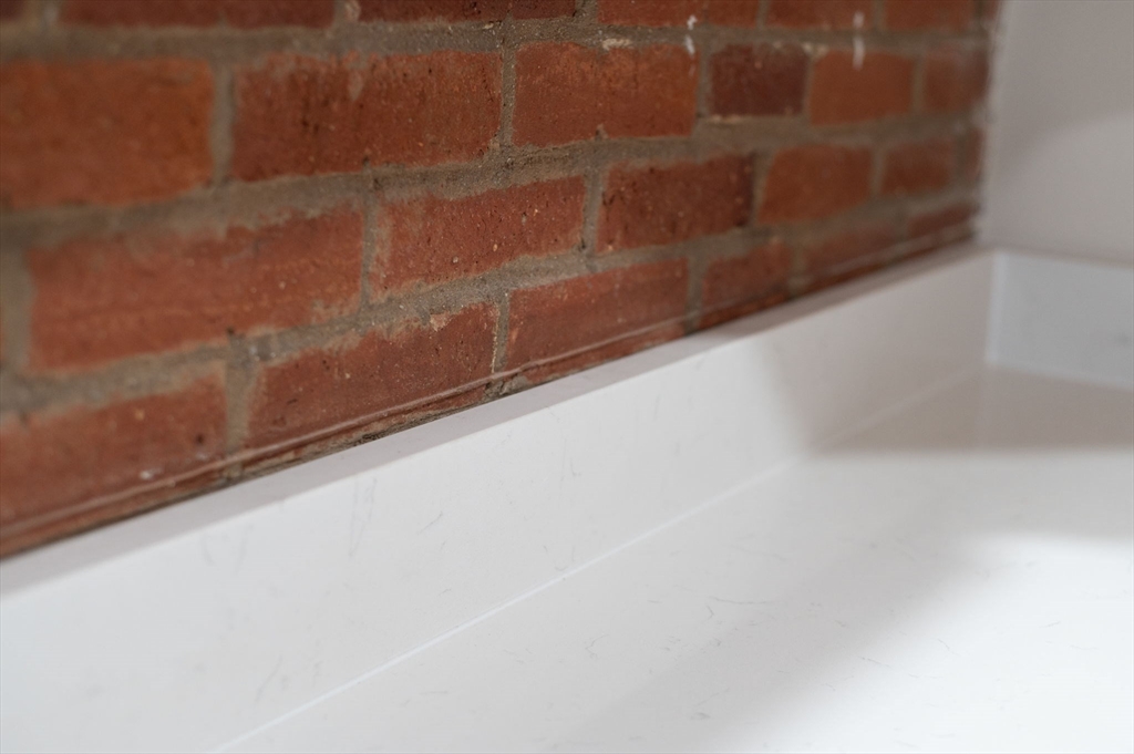 72 River Street, Unit 6 Haverhill, MA 01832 - Photo 16 of 40 a close up of a bathtub