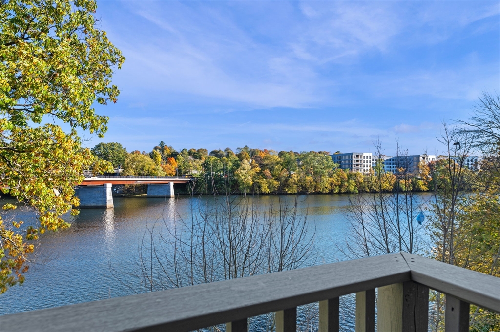 72 River Street, Unit 6 Haverhill, MA 01832 - Photo 25 of 40 a view of a lake with boats and trees in the background