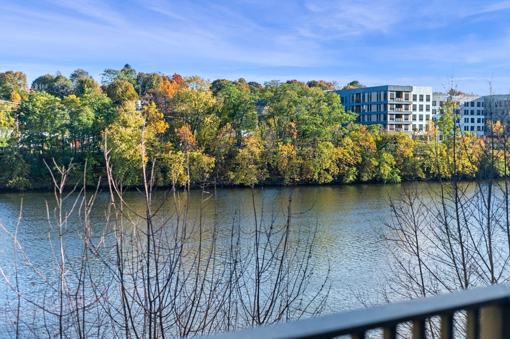 72 River Street, Unit 6 Haverhill, MA 01832 - Photo 27 of 40 a view of a lake with a building in the background