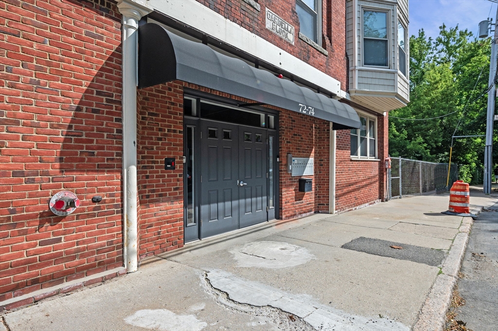 72 River Street, Unit 6 Haverhill, MA 01832 - Photo 4 of 40 a view of a wooden door of the house