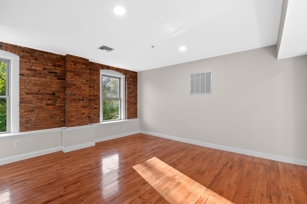 72 River Street, Unit 6 Haverhill, MA 01832 - Photo 10 of 40 a view of an empty room with a window