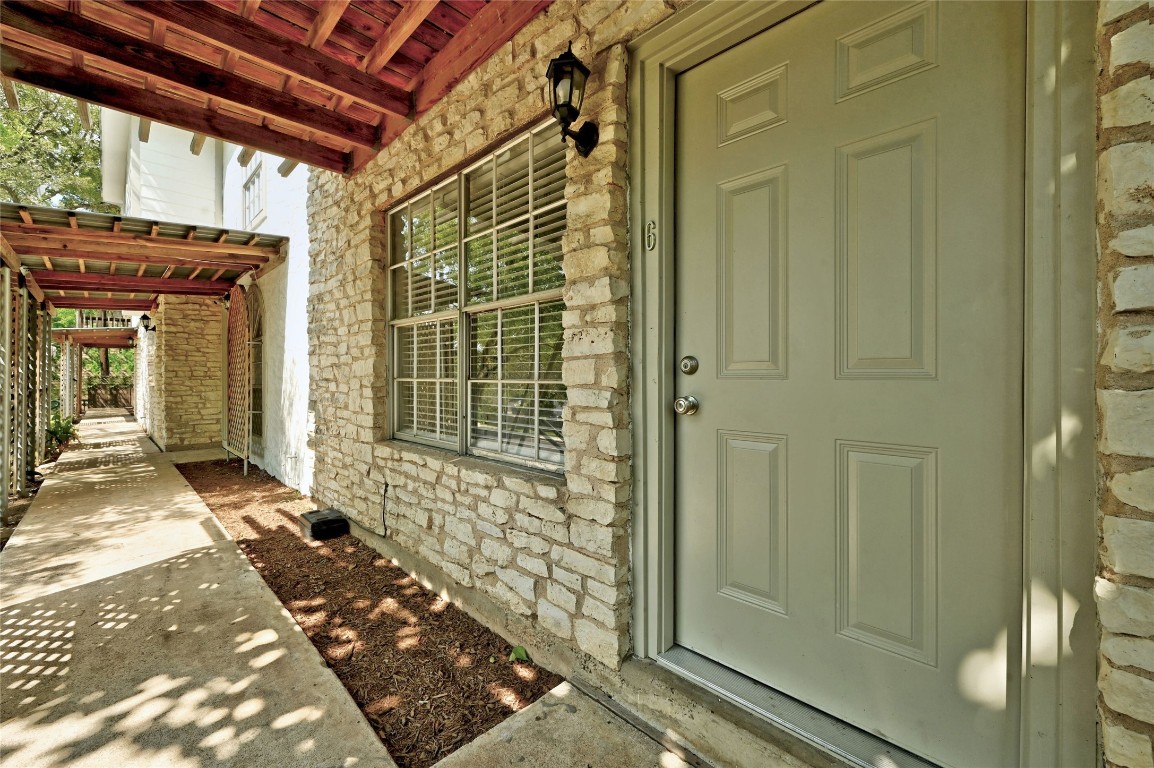 1200 Banister Lane, Unit 4 Austin, TX 78704 - Photo 4 of 15 a view of the door of the house