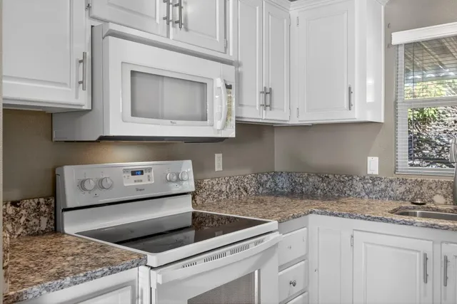 an aerial view of a city with lots of residential buildings