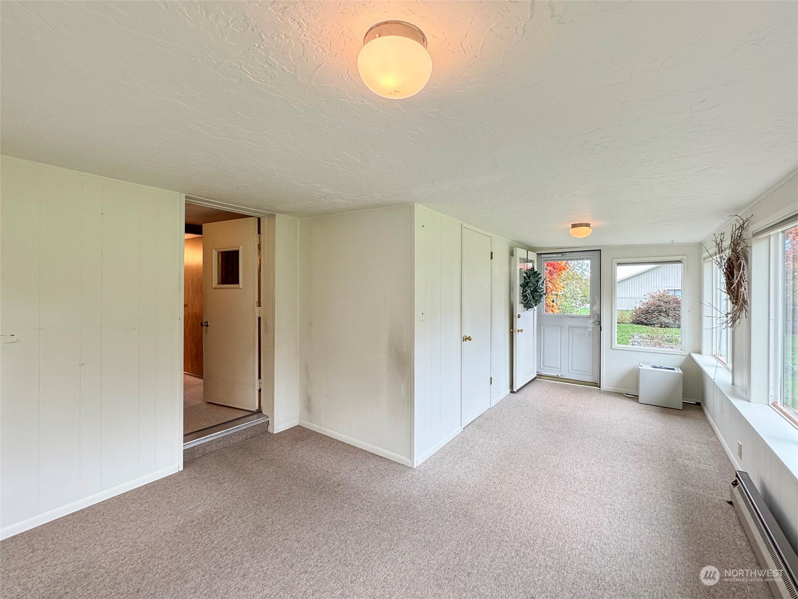 241 Evans Road Sequim, WA 98382 - Photo 24 of 40 a view of an empty room with a window