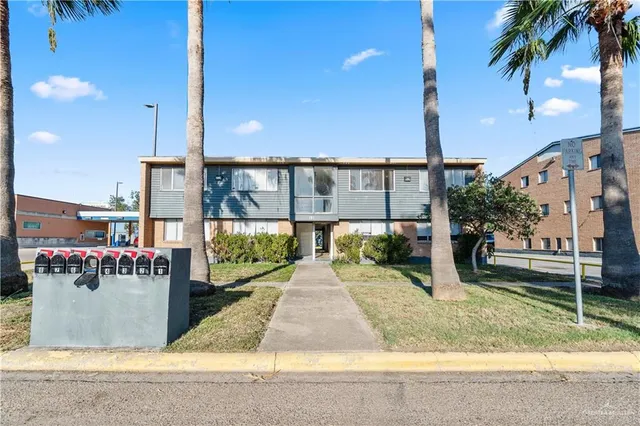 a view of a street with sitting area