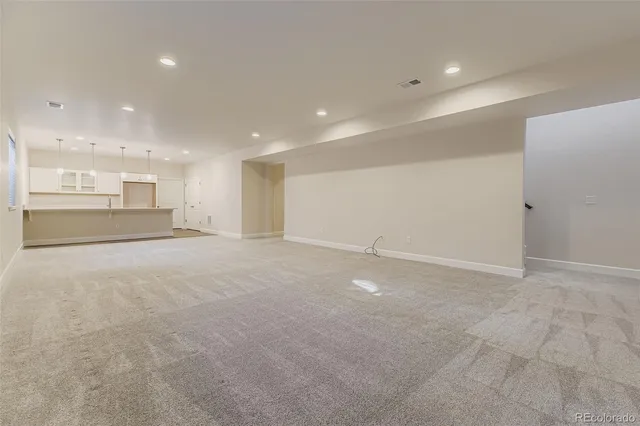 a view of cabinets with wooden floor