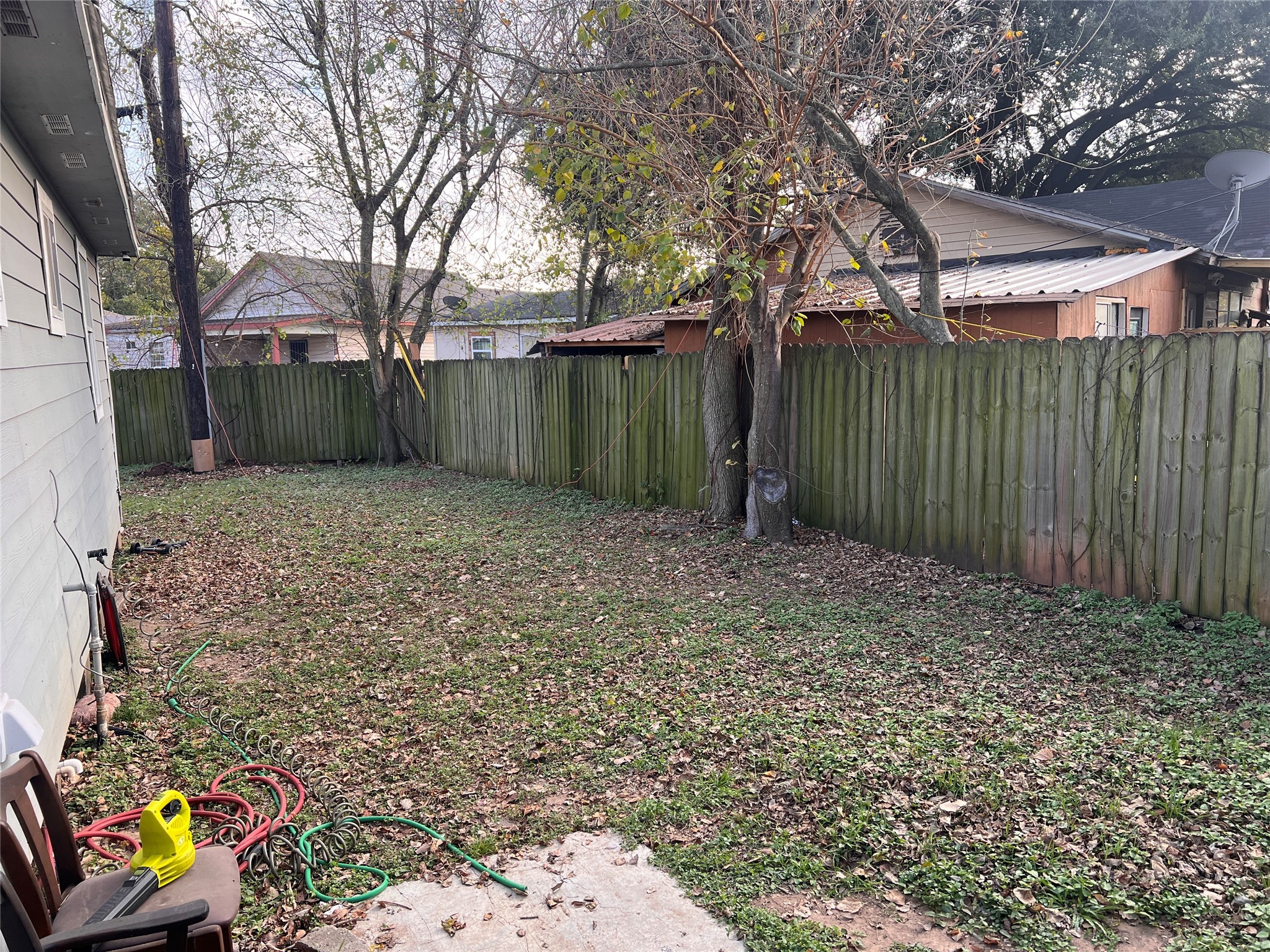 110 Gans Street Houston, TX 77029 - Photo 16 of 17 a view of a backyard with a tree