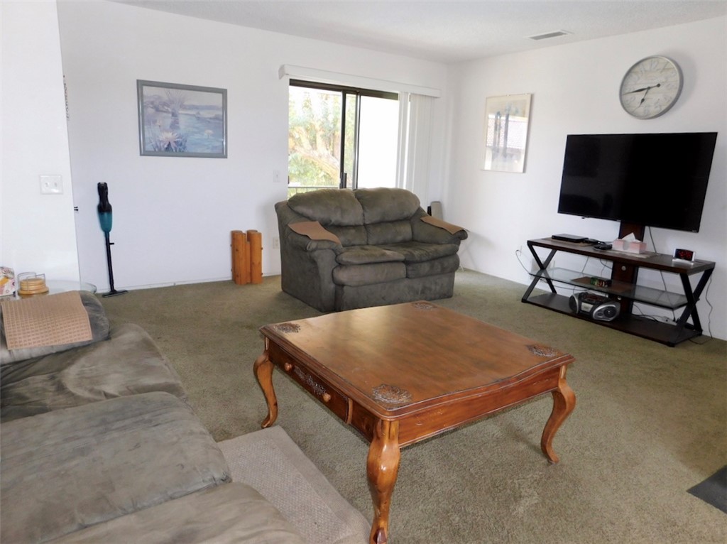 1190 Ramar Road, Unit 8 Bullhead City, AZ 86442 - Photo 3 of 24 sliding glass door to balcony