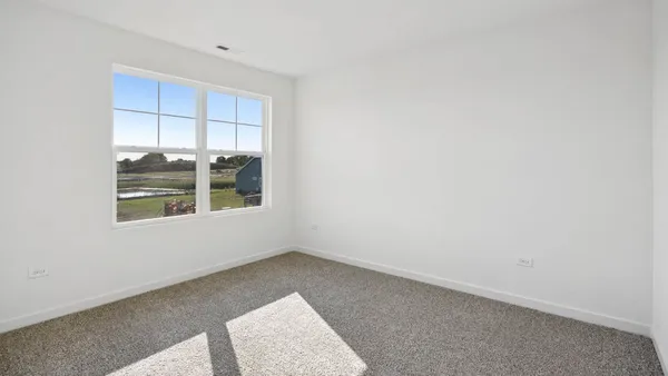 an empty room with a window