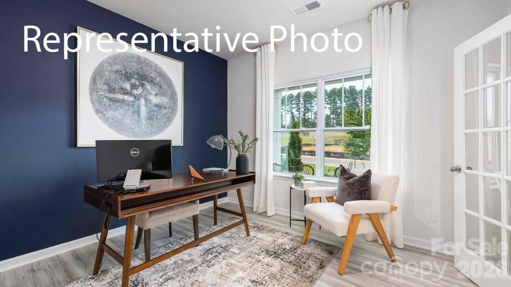 7592 Bainbridge Road Sherrills Ford, NC 28673 - Photo 26 of 28 a workspace with furniture and a window
