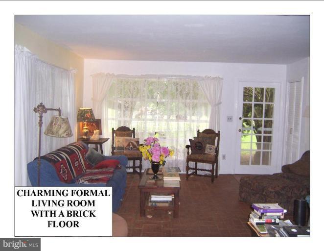 DETAILS INCLUDE BRICK FLOOR & BAY WINDOW