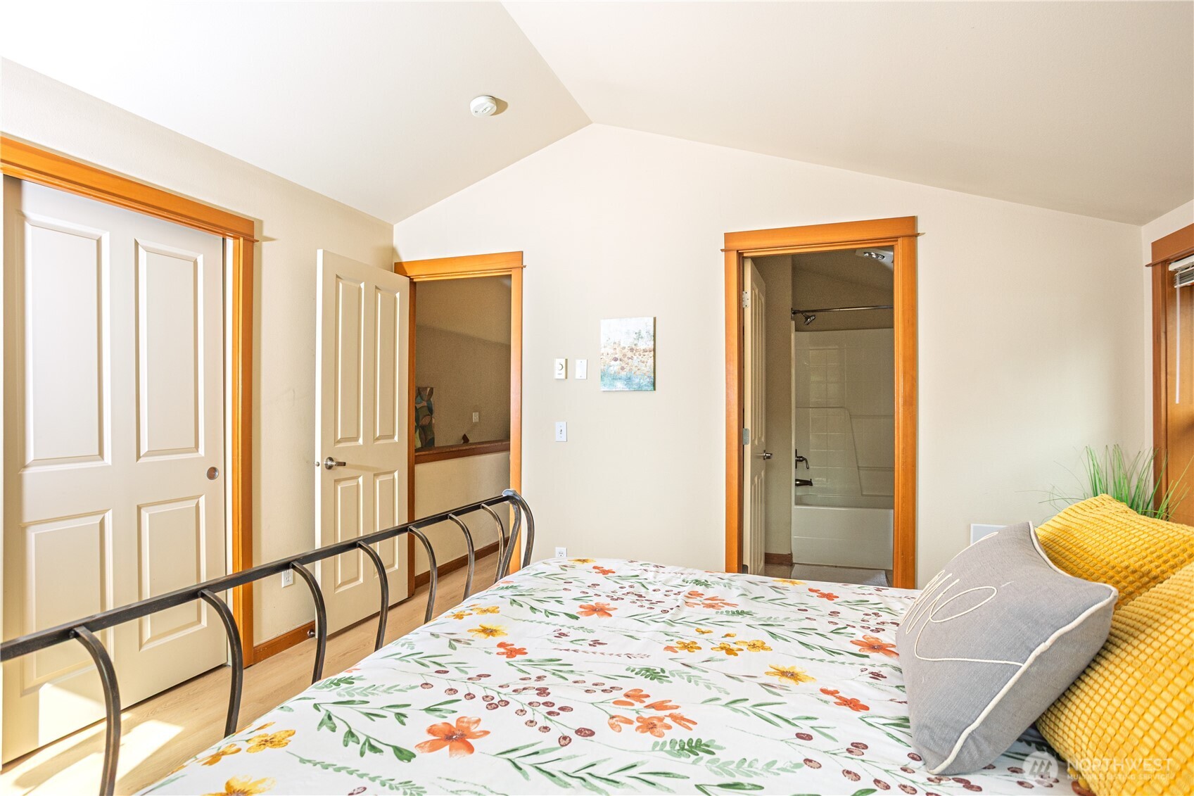 3314 Wetmore Avenue South, Unit B Seattle, WA 98144 - Photo 15 of 28 a bedroom with a bed and a window