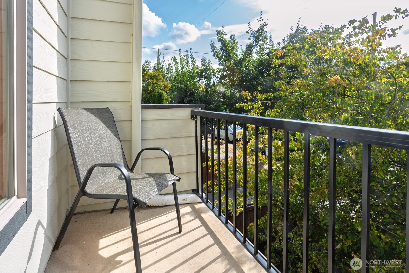 3314 Wetmore Avenue South, Unit B Seattle, WA 98144 - Photo 23 of 28 a view of balcony with wooden floor and outdoor seating