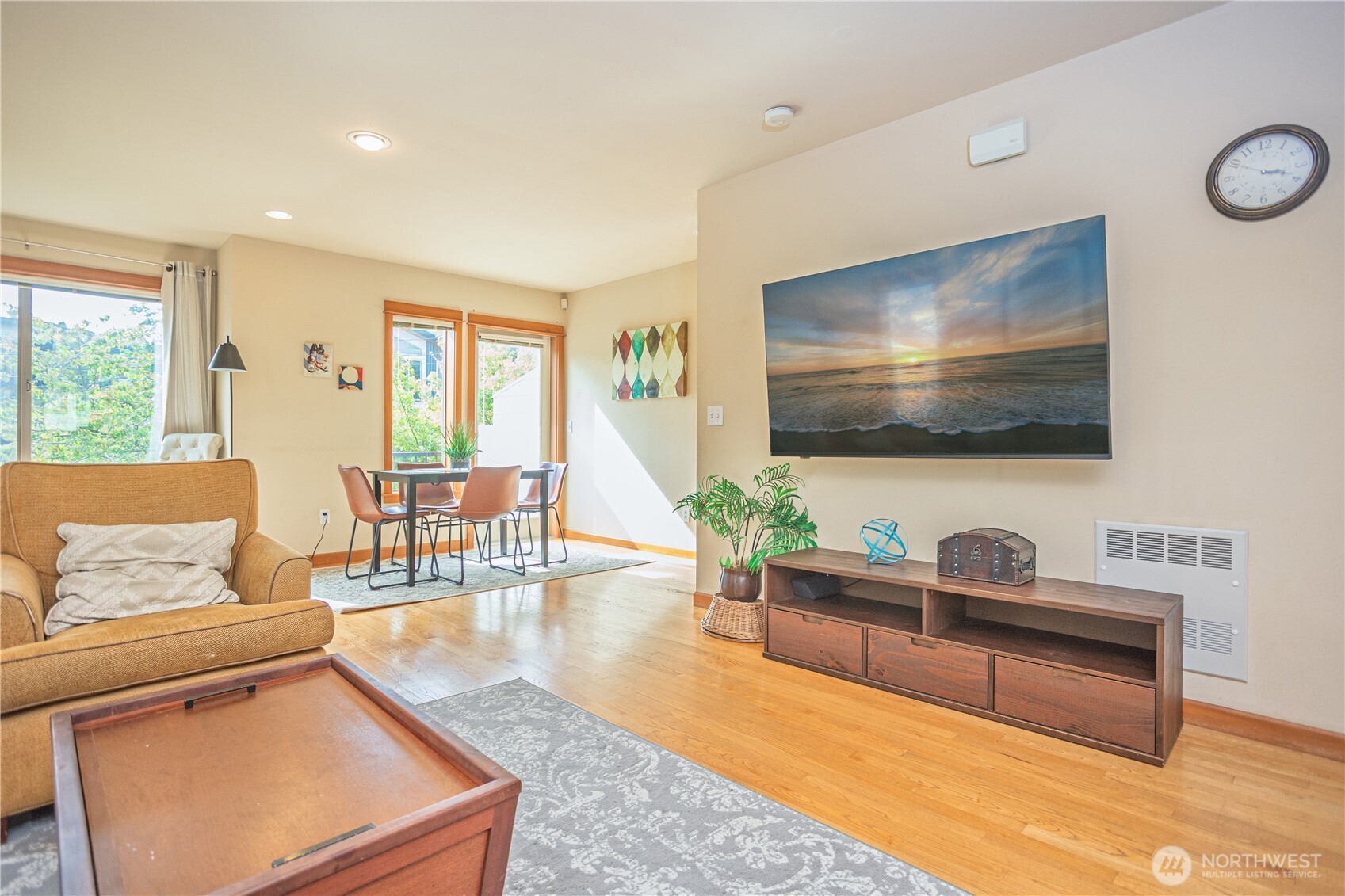 3314 Wetmore Avenue South, Unit B Seattle, WA 98144 - Photo 5 of 28 a living room with furniture and a flat screen tv