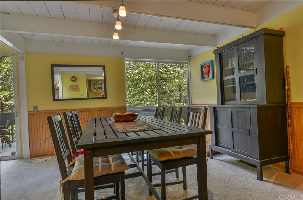 26415 Fernrock Road Twin Peaks, CA 92391 - Photo 14 of 23 a view of a dining room with furniture window and outside view