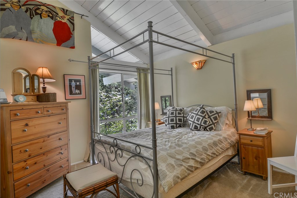 26415 Fernrock Road Twin Peaks, CA 92391 - Photo 16 of 23 a bedroom with a bed and a dresser