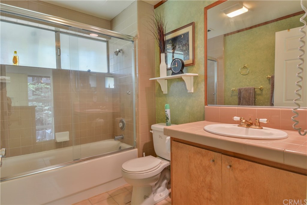 26415 Fernrock Road Twin Peaks, CA 92391 - Photo 17 of 23 a bathroom with a sink a toilet and shower