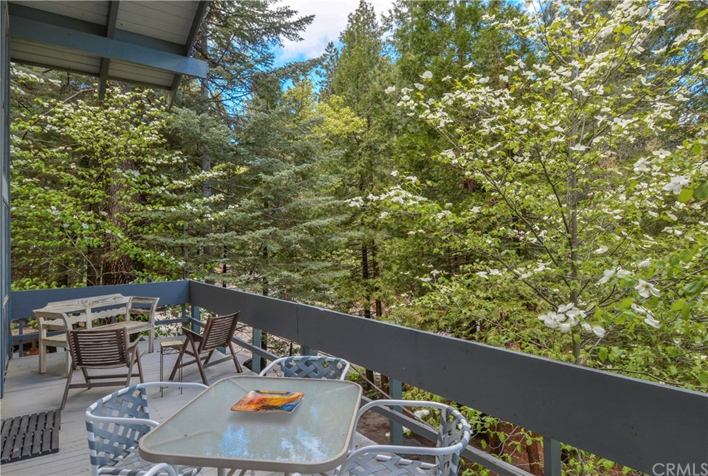 26415 Fernrock Road Twin Peaks, CA 92391 - Photo 22 of 23 a balcony with table and chairs