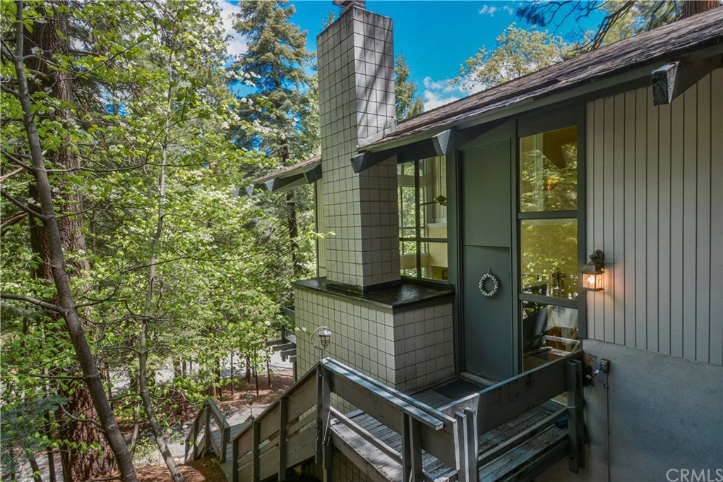 26415 Fernrock Road Twin Peaks, CA 92391 - Photo 3 of 23 front view of a house with a tree