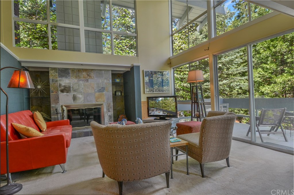 26415 Fernrock Road Twin Peaks, CA 92391 - Photo 5 of 23 a living room with fireplace furniture and a large window