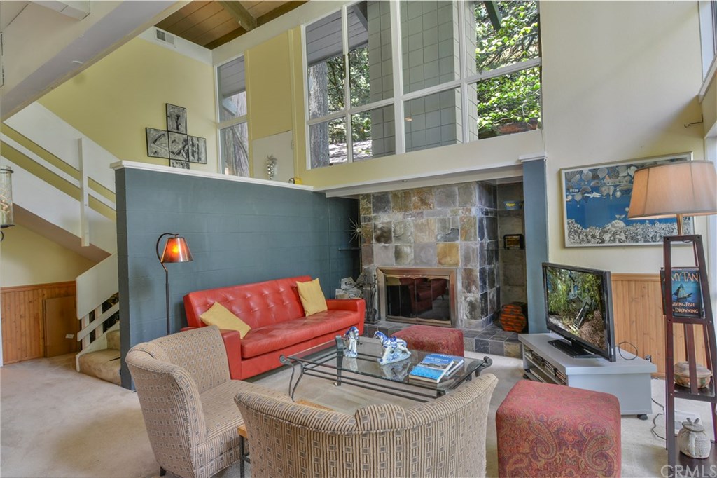 26415 Fernrock Road Twin Peaks, CA 92391 - Photo 6 of 23 a living room with furniture and a fireplace