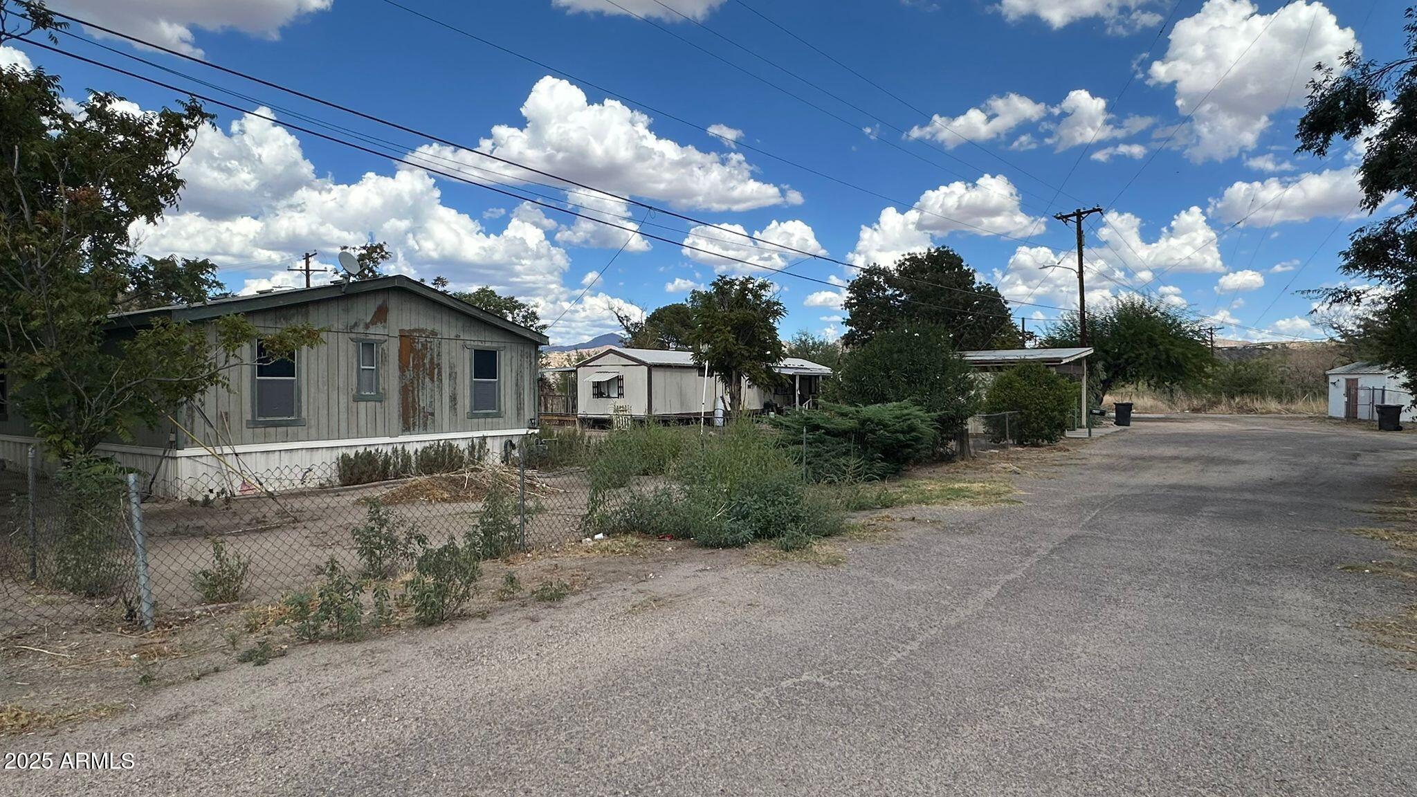 4518 Broadway Claypool, AZ 85532 - Photo 3 of 5 a view of a house with a yard